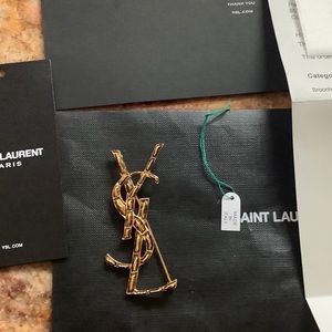 SOLD.  YSL Brooch brand new in box with receipt.